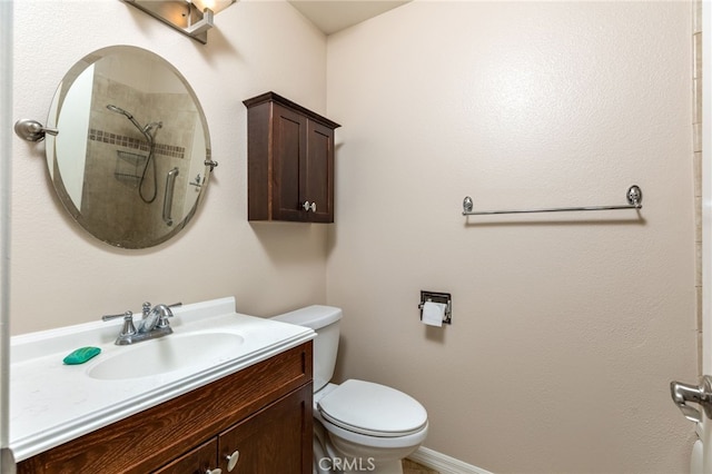 573 La Costa Dr, Banning, CA 92220 - bathroom with toilet, vanity, and a shower