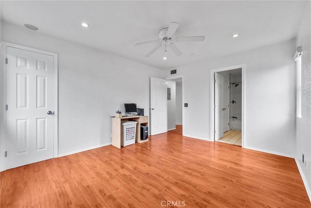unfurnished bedroom featuring recessed lighting, baseboards, and light wood-style floors