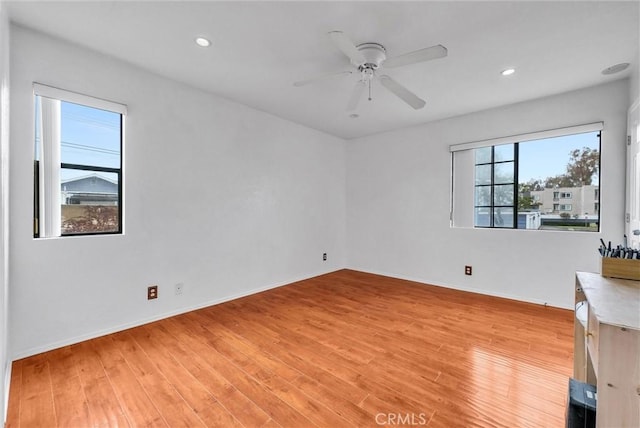 4900 N Grand Ave Unit 325, Covina, CA 91724 - spare room featuring light wood-style floors, a ceiling fan, recessed lighting, and baseboards