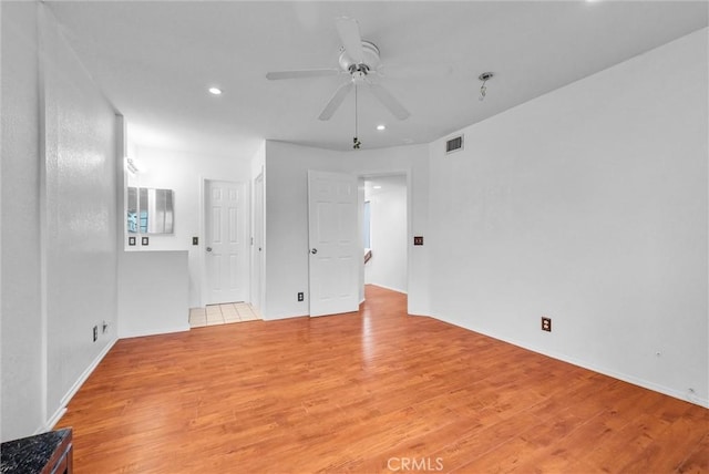 4900 N Grand Ave Unit 325, Covina, CA 91724 - empty room featuring light wood-style floors, a ceiling fan, recessed lighting, and baseboards
