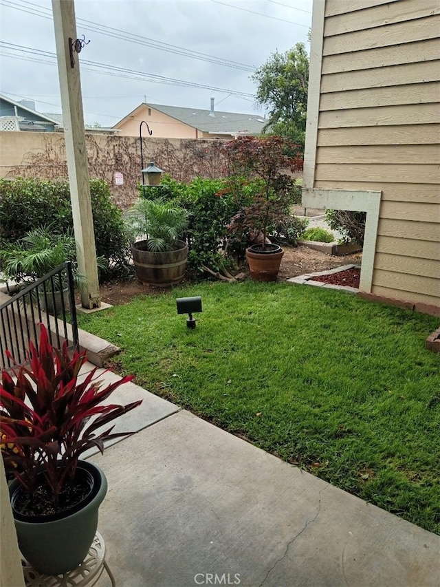 view of yard with fence
