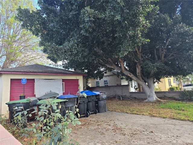 view of property exterior with a garage