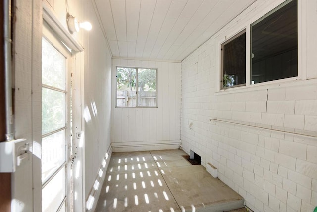 sunroom with wood ceiling