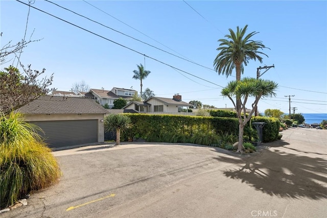 1900 Catalina St, Laguna Beach, CA 92651 - view of front of property featuring fence and a garage
