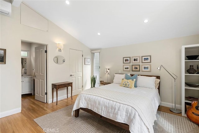1900 Catalina St, Laguna Beach, CA 92651 - bedroom with light wood-type flooring, recessed lighting, a wall mounted AC, lofted ceiling, and baseboards