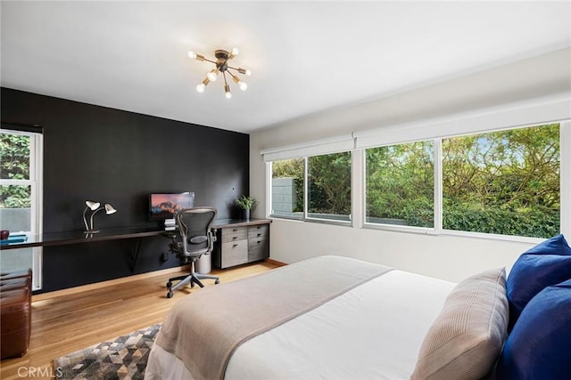 1900 Catalina St, Laguna Beach, CA 92651 - bedroom with an inviting chandelier and wood finished floors