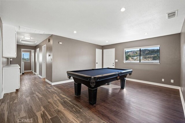 game room with a wealth of natural light, pool table, and dark hardwood / wood-style flooring