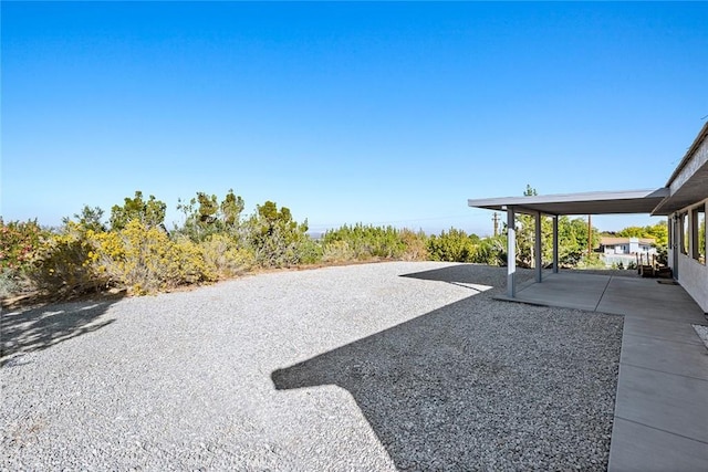 view of yard featuring a patio