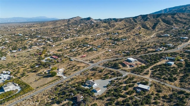 bird's eye view with a mountain view