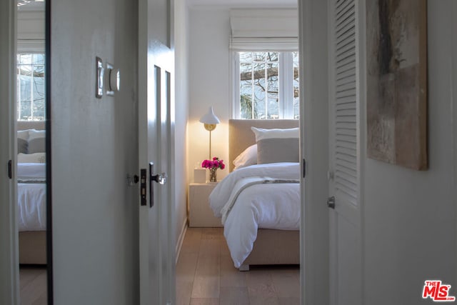 bedroom with light hardwood / wood-style flooring