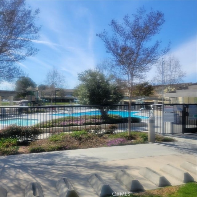 community pool with fence