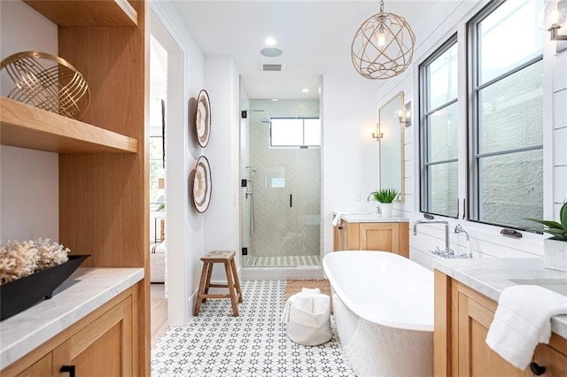 409 39th St, Newport Beach, CA 92663 - full bath with a stall shower, two vanities, and a freestanding bath