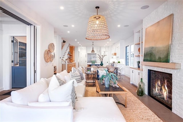 409 39th St, Newport Beach, CA 92663 - living room with wood finished floors, a fireplace, and recessed lighting