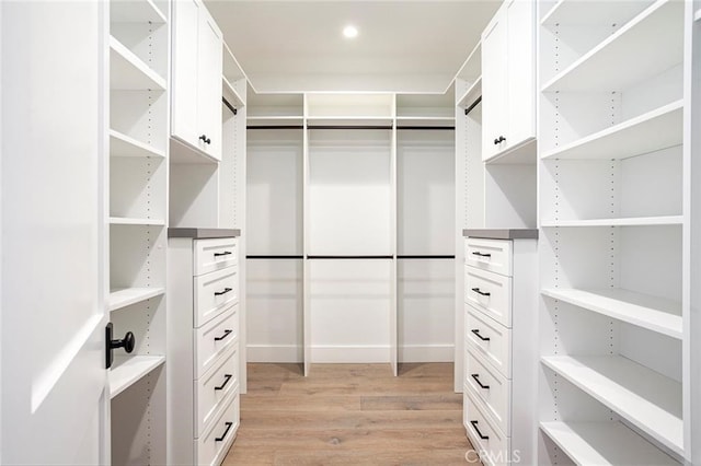 409 39th St, Newport Beach, CA 92663 - walk in closet with light wood-type flooring