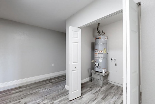 utility room with secured water heater