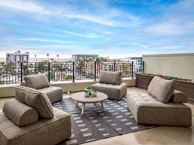 view of patio / terrace with a balcony