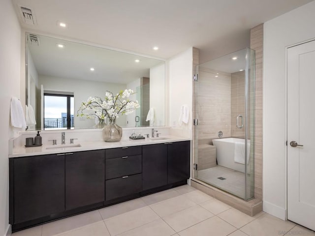 bathroom with vanity, tile patterned flooring, and independent shower and bath