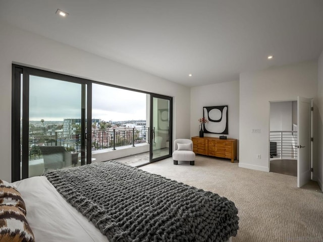 bedroom featuring access to exterior and carpet floors