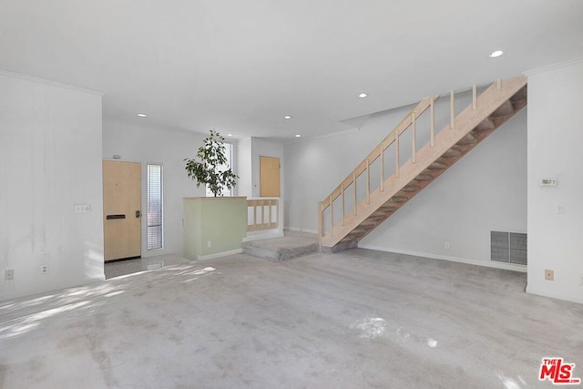 unfurnished room featuring ornamental molding