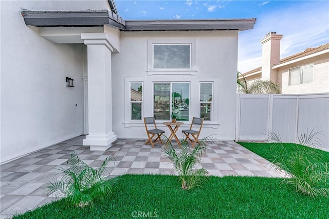 rear view of house featuring a patio area