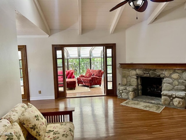 205 Pirie Rd Unit 64, Ojai, CA 93023 - living room featuring wood finished floors, a ceiling fan, and a stone fireplace
