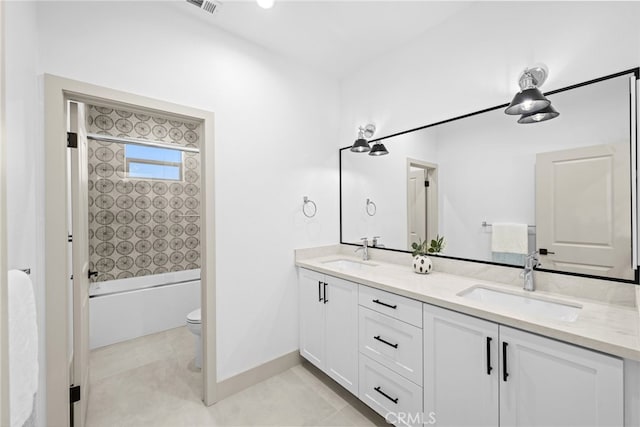 full bathroom with double vanity, toilet, washtub / shower combination, and a sink