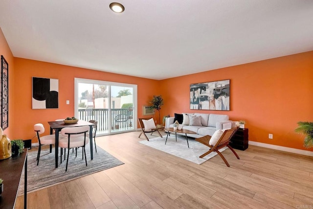 living room with light hardwood / wood-style floors