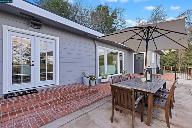 view of patio featuring french doors