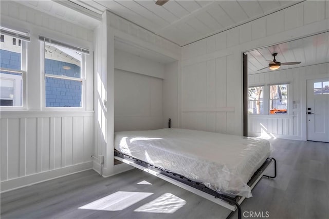 unfurnished bedroom featuring ceiling fan and wood-type flooring