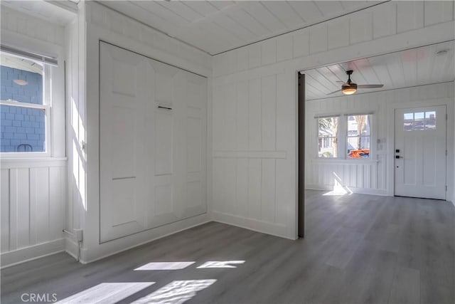 entrance foyer with ceiling fan and dark hardwood / wood-style floors