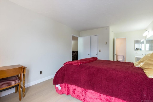 bedroom featuring light wood-type flooring