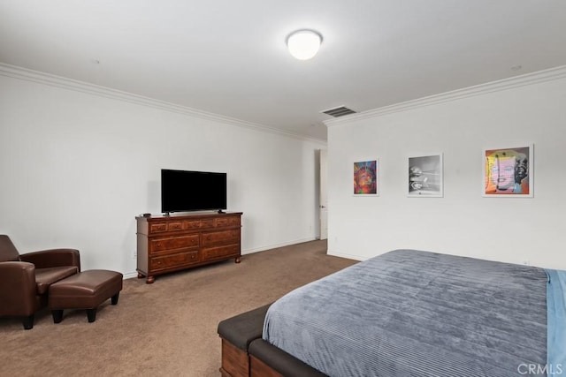 bedroom featuring crown molding and carpet floors