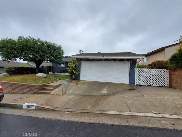 single story home with a garage