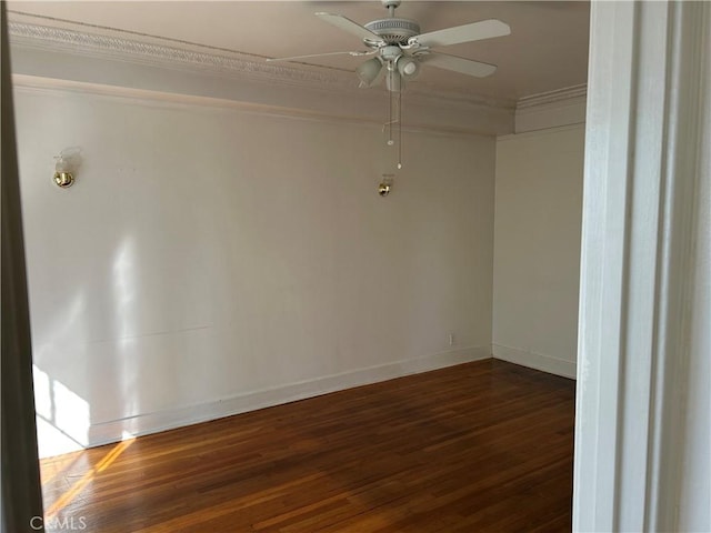 unfurnished room with crown molding, ceiling fan, and dark hardwood / wood-style flooring