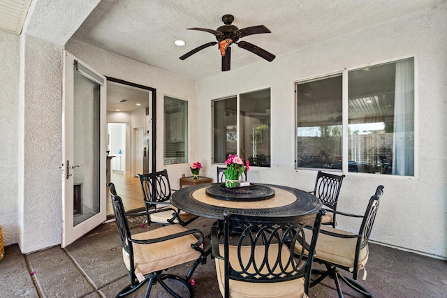 view of patio featuring ceiling fan