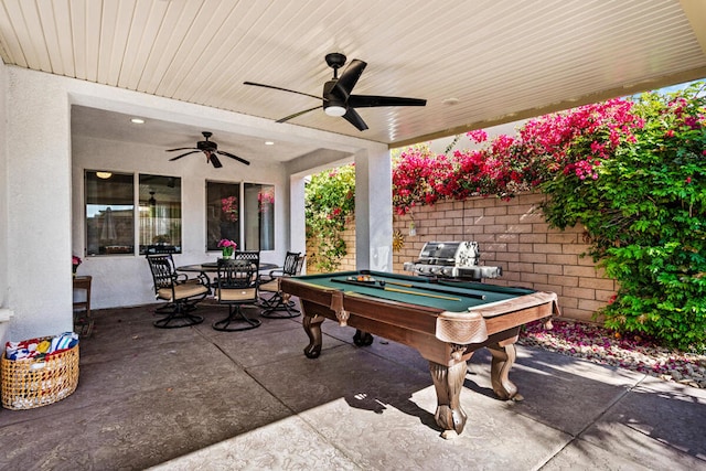 view of patio / terrace featuring ceiling fan