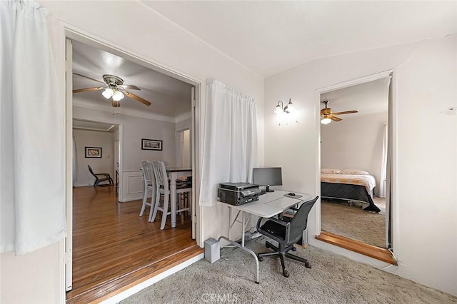 office with ceiling fan and wood-type flooring