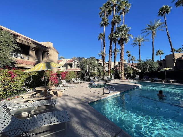 pool featuring a patio