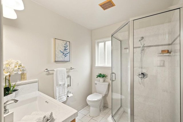 bathroom featuring an enclosed shower, vanity, tile patterned floors, and toilet