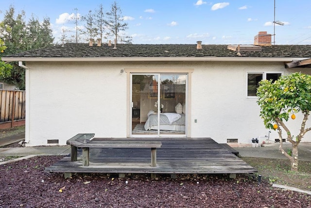 rear view of house with a deck