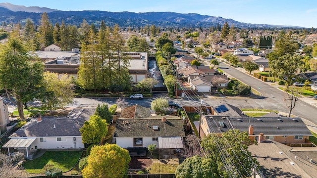 birds eye view of property featuring a mountain view