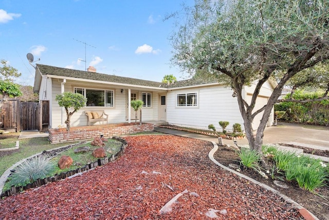 ranch-style home featuring a garage