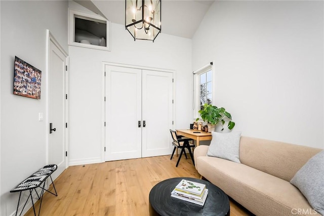 interior space featuring a notable chandelier and hardwood / wood-style flooring