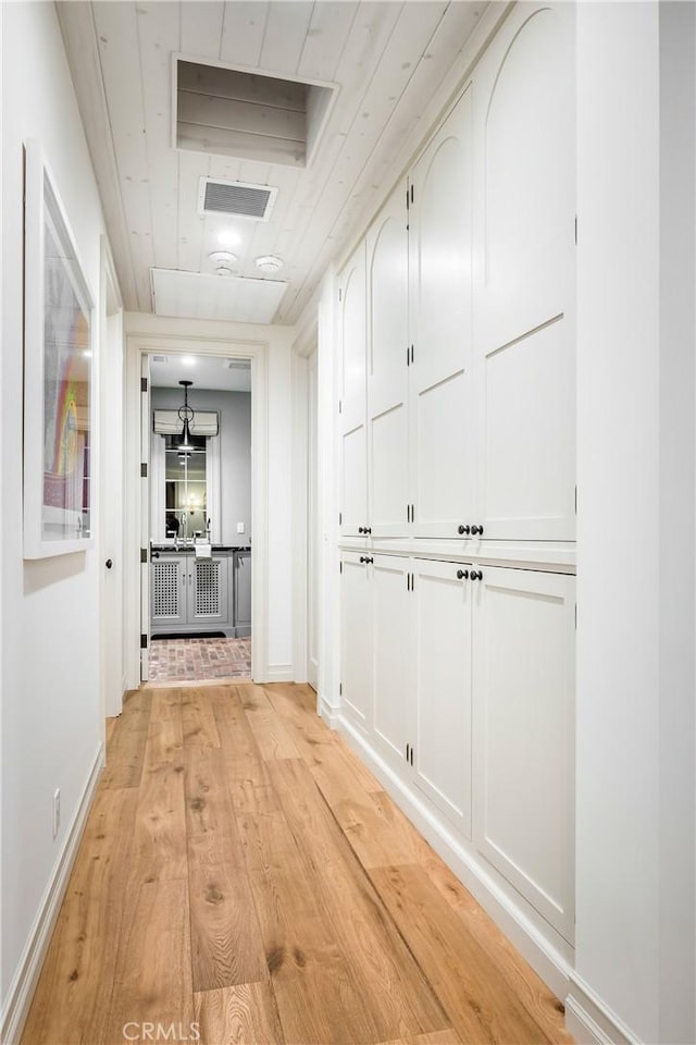 hall featuring light hardwood / wood-style flooring