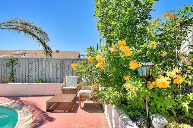 view of patio / terrace with a swimming pool