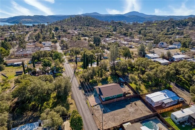 birds eye view of property featuring a mountain view