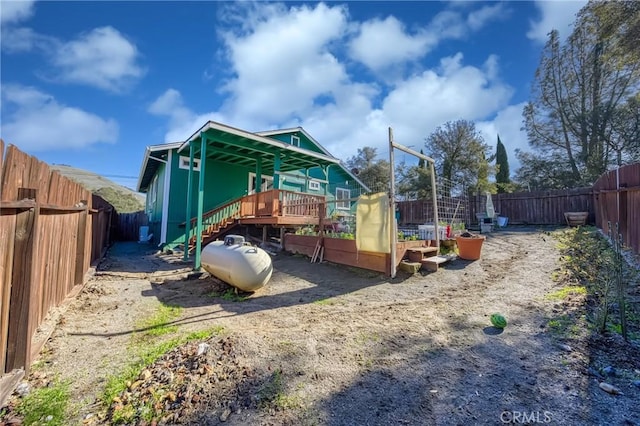 view of play area with a fenced backyard