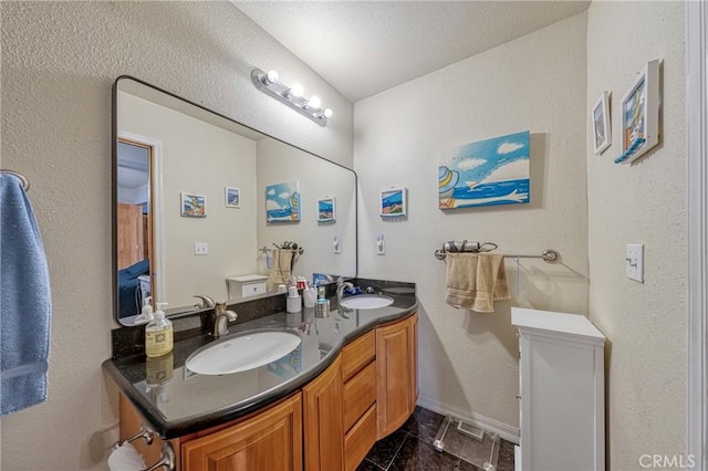 bathroom featuring vanity and tile patterned floors