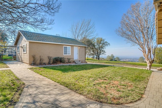 exterior space featuring a lawn