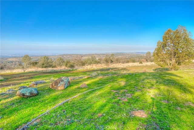 exterior space with a rural view